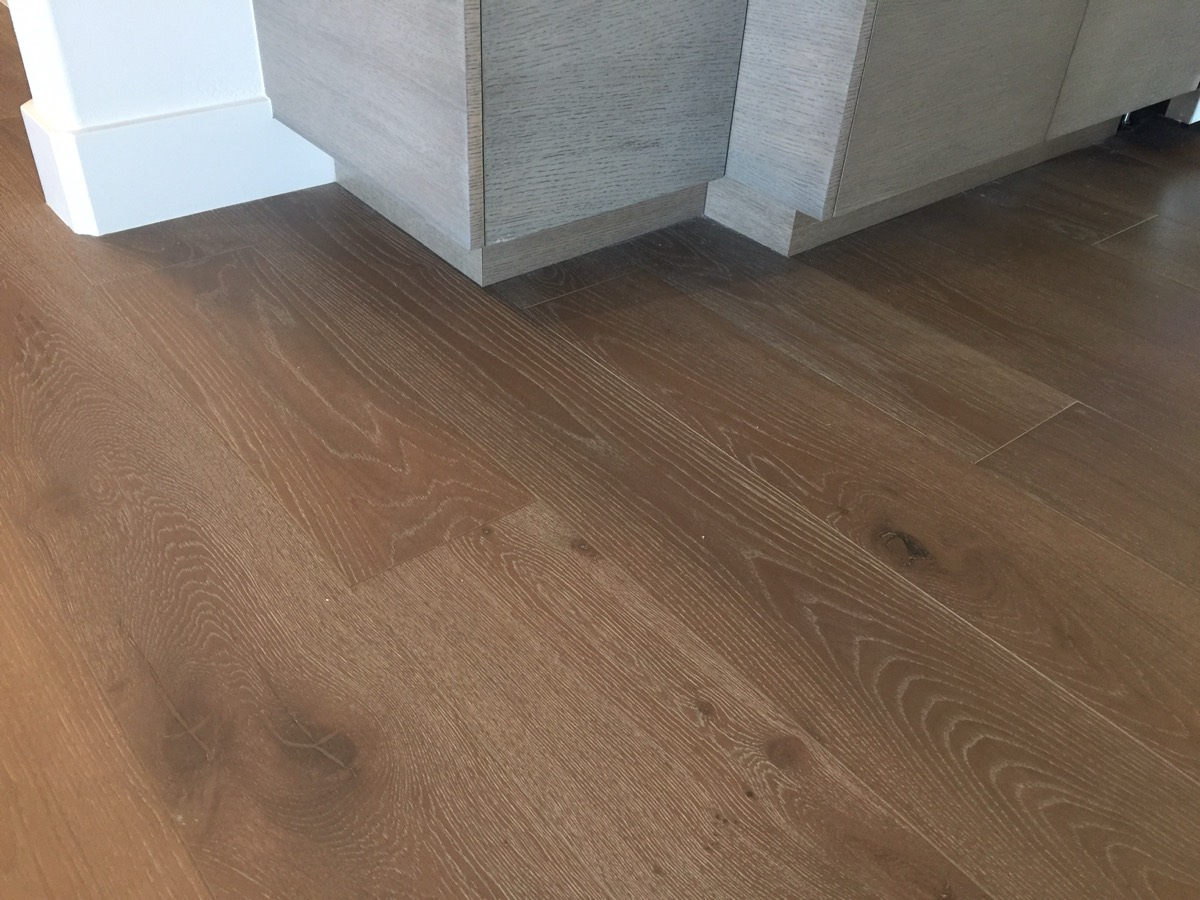 Close-up of wire-brushed wide plank oak flooring