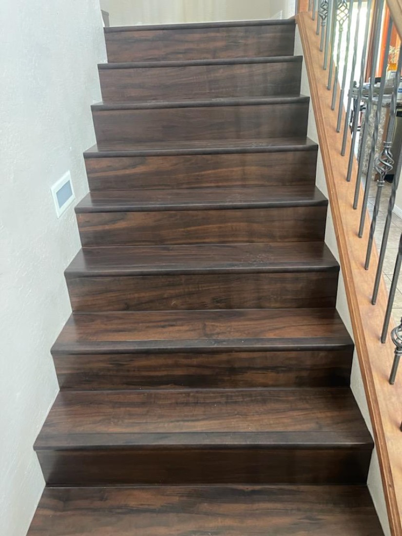 Finished dark hardwood staircase after refinishing