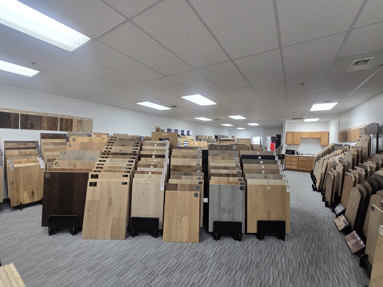 Rows of hardwood sample boards standing in racks