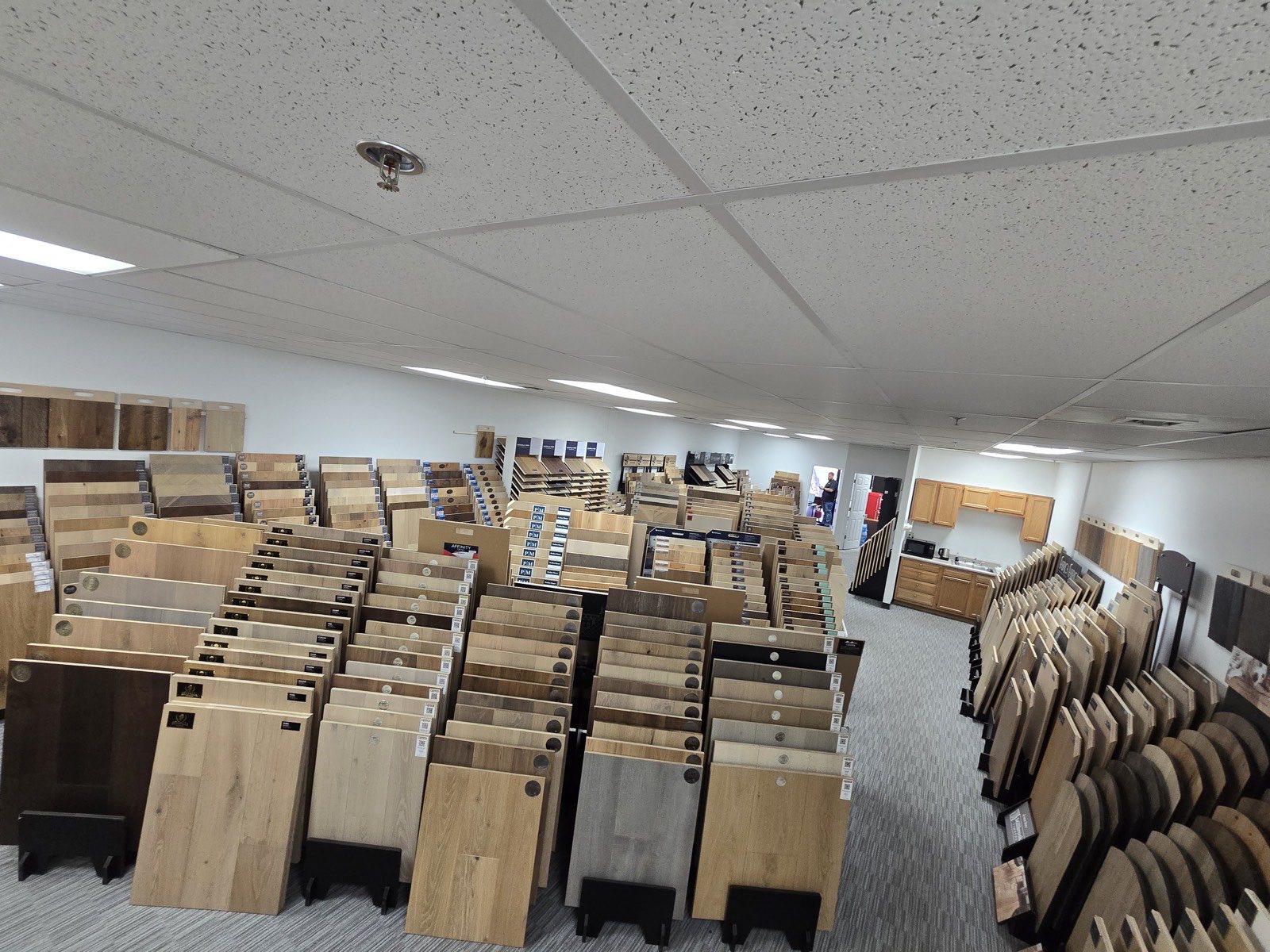 Wide view of the Olympic Hardwood showroom in Phoenix, racks of samples filling the floor