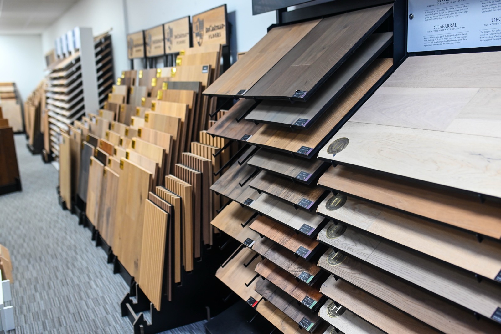 Tiered display rack with engineered hardwood samples fanned out